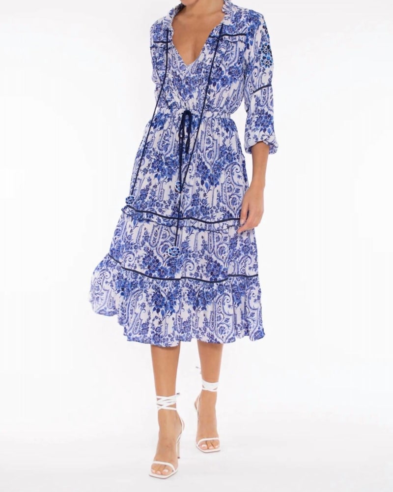 Front of a model wearing a size Large Baxedes Dress In Blue Flowers in Blue Flowers by TAJ by SABRINA CRIPPA. | dia_product_style_image_id:346668